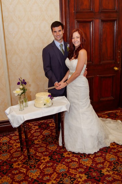  Love in Killarney couple cutting cake 