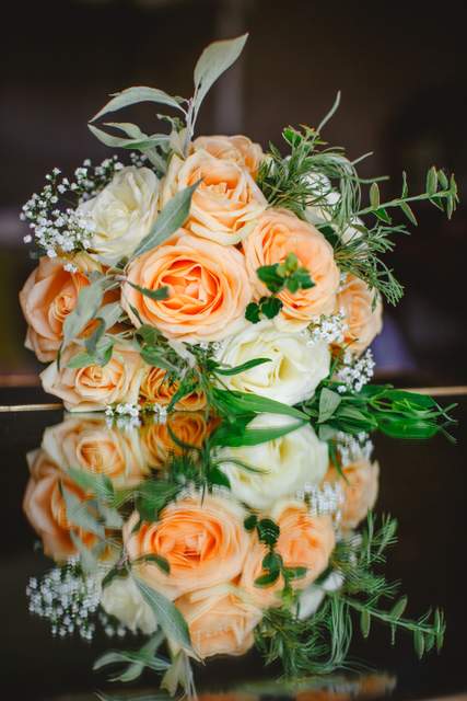 peach white and green brides bouquet 