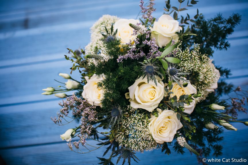 winter wedding flowers thistle white roses heather 