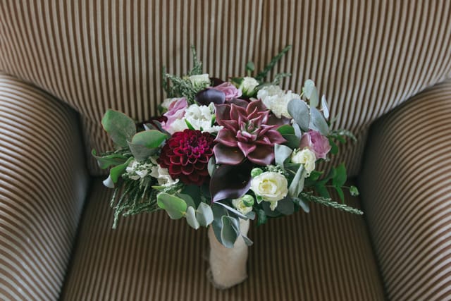 Plum white and eucalyptus bouquet Destination elopement wedding Ireland Irish Seaside Elopement